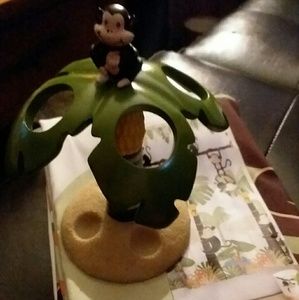 Fabric shower curtain and toothbrush holder